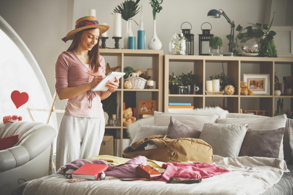 girl making a travel list