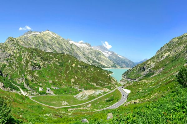 Grimsel Pass (Switzerland): Approach from Meiringen for a gradual climb; the pass offers winding roads and unforgettable Swiss Alpine views, including the picturesque Grimselsee and the historic Totensee.