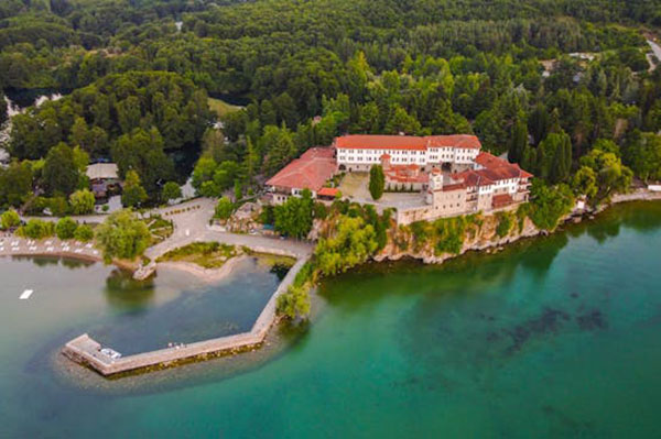 Sveti Naum Monastery: An imposing 10th-century monastery complex on the southern shore of the lake, renowned for its serene setting, peacocks, and the powerful springs nearby.
