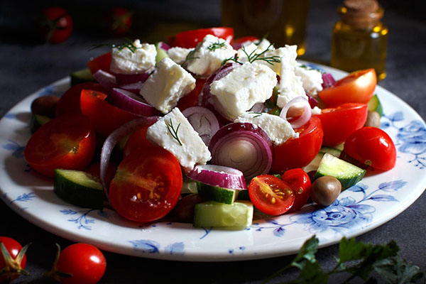 Shopska Salad, Greek salad (Region-wide)  – Fresh tomato, cucumber, feta, and onion.