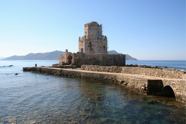 Methoni Castle, Messenia,: Venetian fortress overlooking the sea, with massive walls, a moat, and a historic harbor